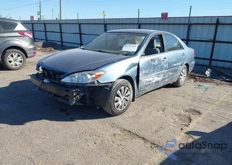 2003 Toyota Camry Le z USA, uszkodzony, nr VIN 4T1BE30K93U641685